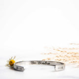 be fearless arrow bracelet inside flower