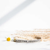 enjoy the journey silver bracelet flower